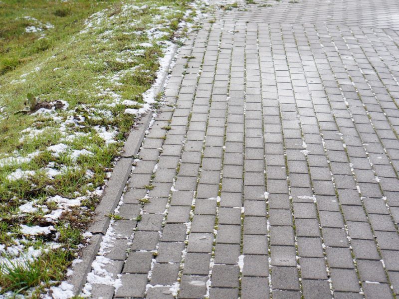 Reiniging van opritten en daken